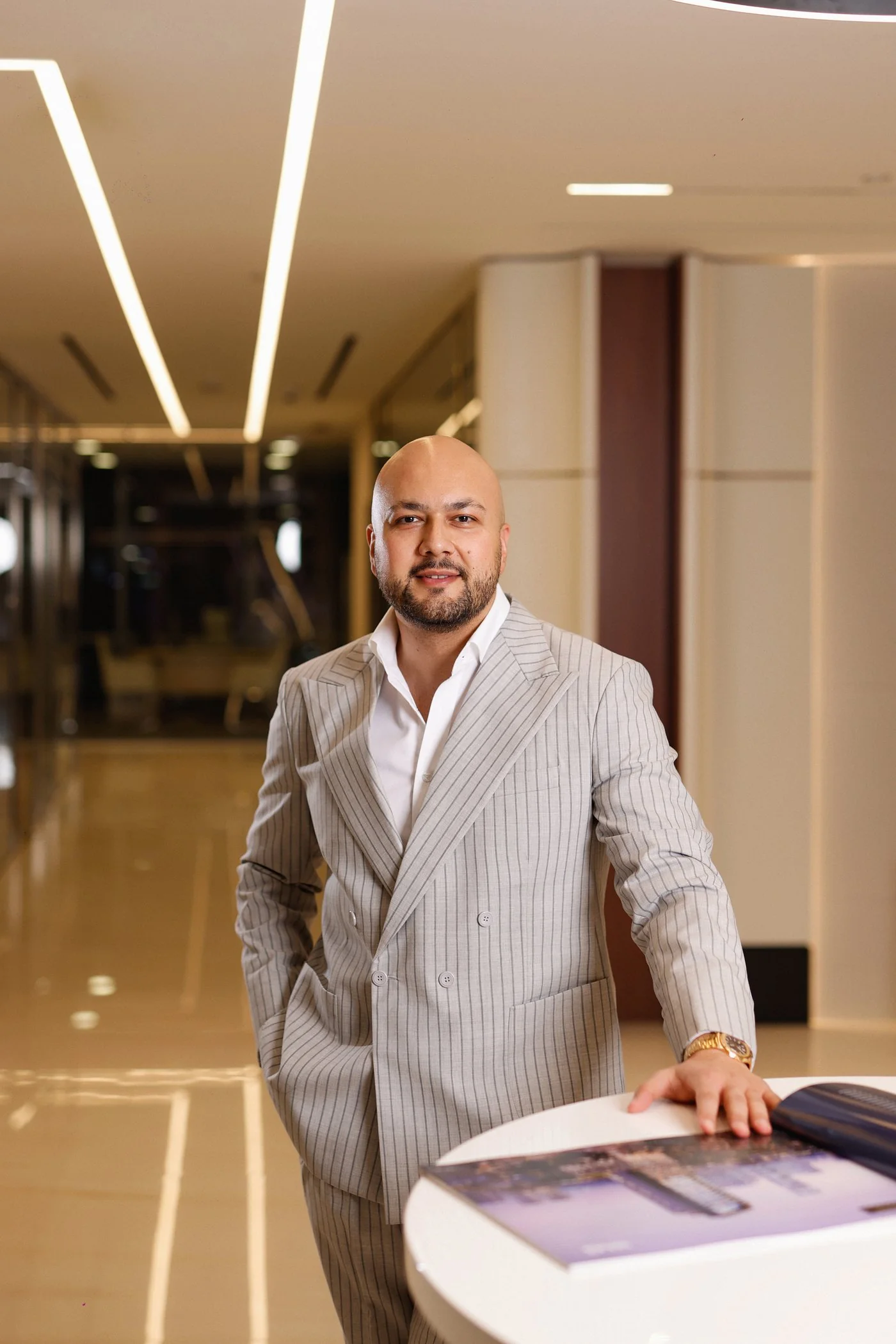 Metin SARI Dubai Executive Lobby Grey Suit Professional